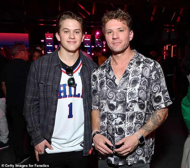 Ryan plays a former NASCAR mechanic named Logan, whose brother Christian disappeared 17 years go. Seen herein February 2022