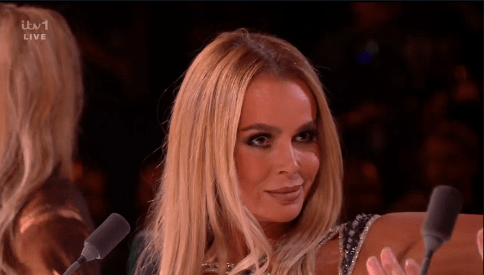 Screenshot of Amanda Holden at a live television event.