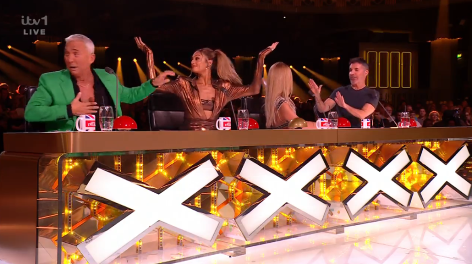 Screenshot of the judges at the X Factor judging panel.