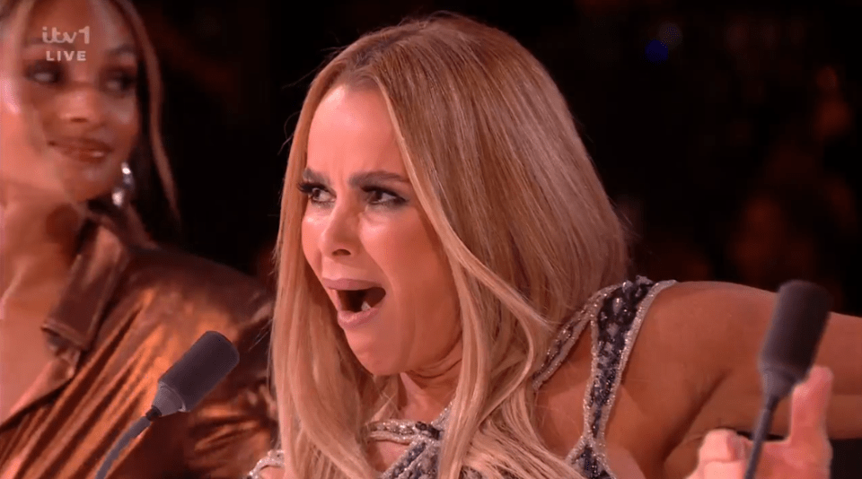 Screenshot of a surprised woman at a judging panel.