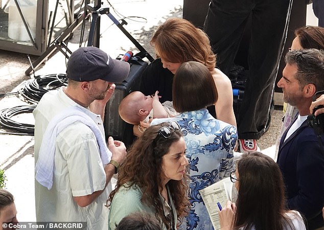 Lily and McDowell faced criticism on social media for using a surrogate, with some claiming they were 'buyers' not parents, and others likening surrogacy to 'human trafficking'