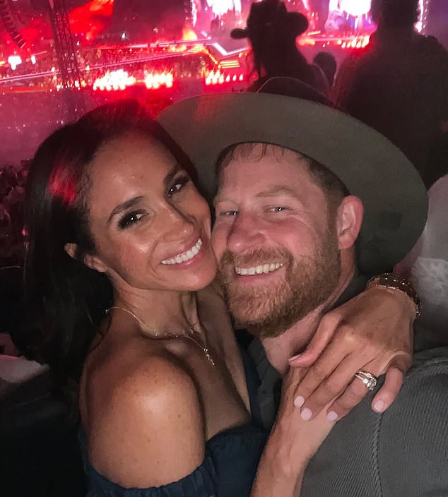 The Sussexes pose for a series of smiley pictures, while donning cowboy hats in keeping with the tour's theme
