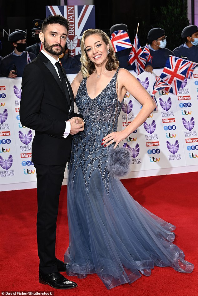 Tom tragically died from brain cancer in 2022, at the age of 33, four years after marrying Kelsey (the couple are pictured in October 2021)