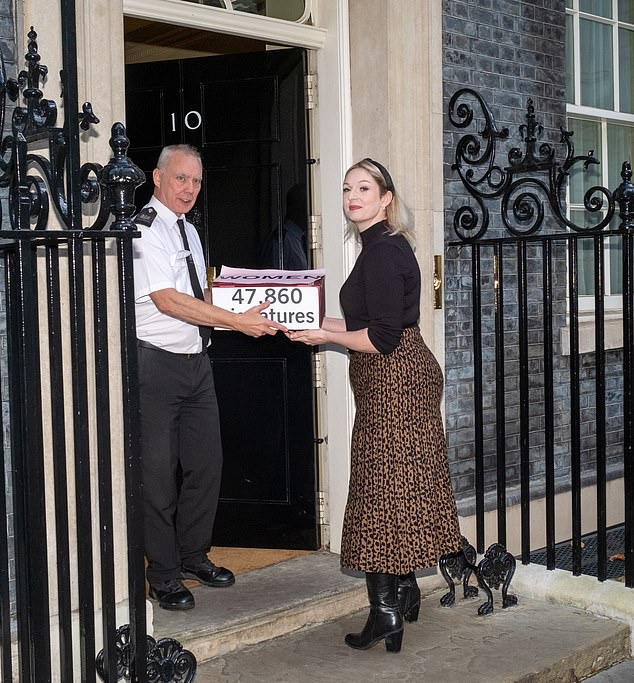 Thousands of people signed a petition in support of the nurses from Darlington Memorial Hospital. Nurse Annice Grundy is pictured delivering the petition to Downing Street
