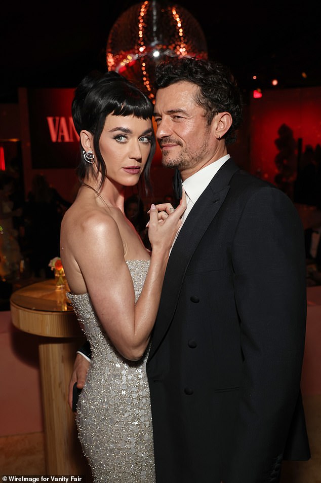 Katy Perry and fiancé Orlando Bloom are expected to be on the guest list; Pictured in Beverly Hills in March