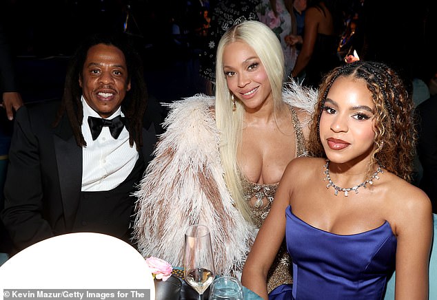 Surely this Kardashian-style muddling of blood and business is a lame departure for one of the most decorated artists in music history. (Pictured: Jay-Z, Beyoncé and Blue Ivy at the Grammy Awards, where Beyoncé won Album of the year for 'Cowboy Carter').