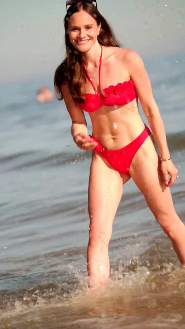 Holly Ramsay posted a video of herself posing on the beach in a bright red bikini, prompting her dutiful fiance, 29, to respond with an emoji with love-heart eyes