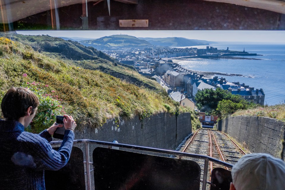 View from a cliff railway in Aberystwyth, Wales, overlooking the town and coastline.