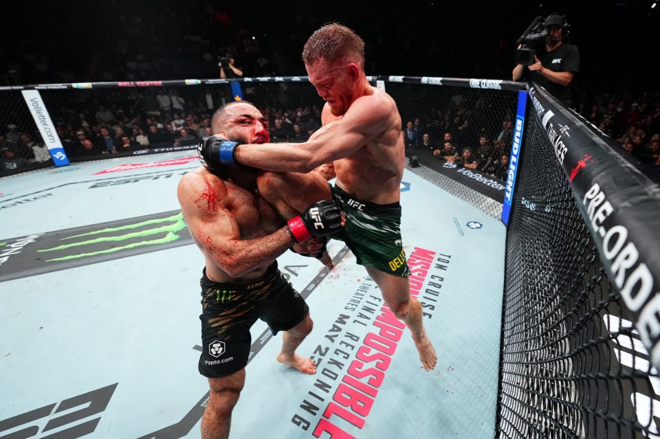 UFC welterweight championship bout: Jack Della Maddalena knees Belal Muhammad.