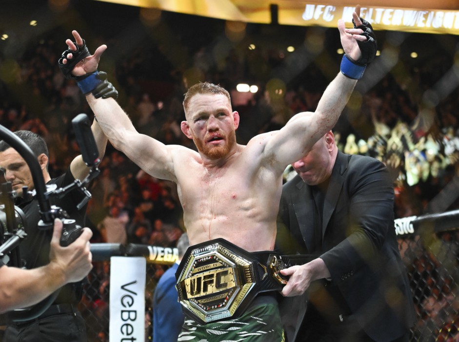 Jack Della Maddalena celebrates his UFC welterweight title win.