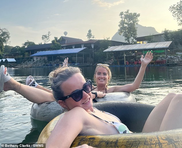 On the fourth day of their trip, at the Nana Backpackers Hostel, Beth and Simone met their friend David and spent the day river ¿tubing¿, bobbing along the Nam Song River in large inflatable rings, stopping for drinks en route