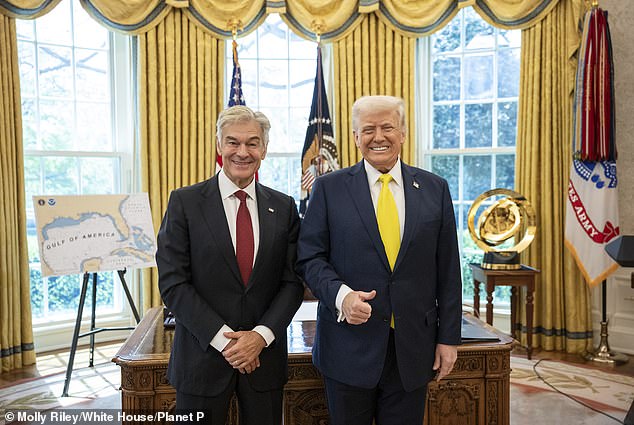 Trump poses with Mehmet Oz after being sworn-in as the administrator of the Centers for Medicare and Medicaid Services at the Oval Office of the White House, April 18, 2025 in Washington, D.C.