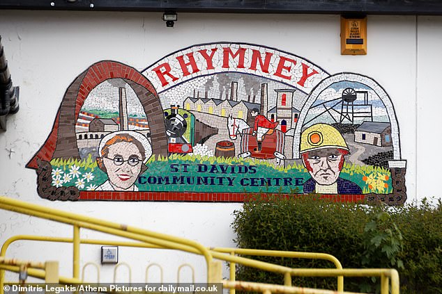 Many still blame the impact Margatet Thatcher had on the town's proud mining community decades ago for its decline. Pictured is a mural where Rhymney's mining heritage is honoured
