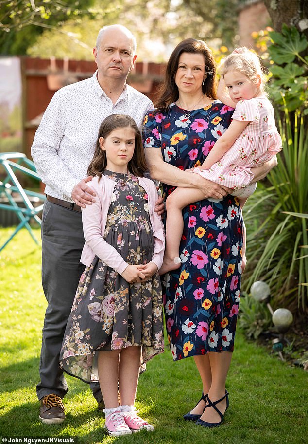Rosaline Levine was arrested with partner Maxie Allen (pictured with children) for malicious communications, harassment and causing a nuisance on school premises but no charges were brought forward