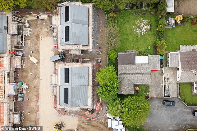The housing estate pictured in an aerial view next to Martine's house (right)