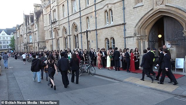 Early on Saturday evening excited students wearing masquerade masks lined up along Broad Street in the city centre as they waited for the doors to open