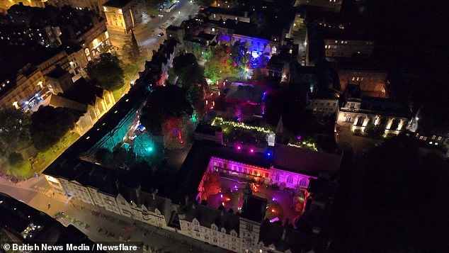 In one aerial image the campus resembles a festival - with colorful strobes lighting up the courtyards