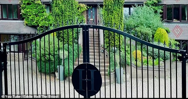 The gates into the 37-year-old's Staffordshire home bear a giant letter 'H' for his initials