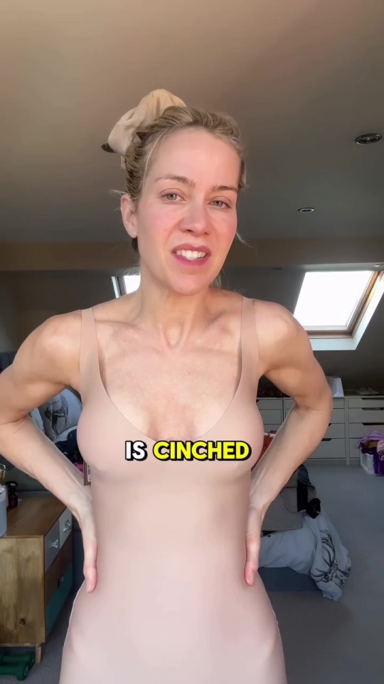 Woman in a beige body suit.  Text overlay reads "is cinched".