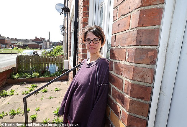 Chef Eva Halili, 41, says she has no intention of passing over her landlords details - despite neighbouring a boarded-up home