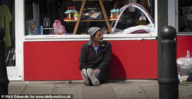 CLACTON: A man sits on the street in the town centre