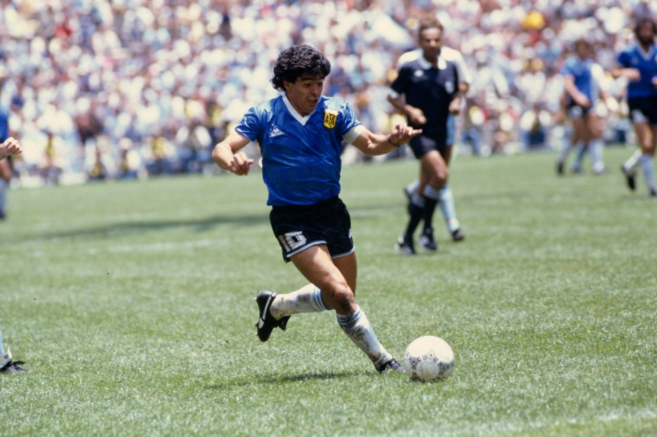 Diego Maradona playing soccer during the 1986 FIFA World Cup quarterfinal match against England.