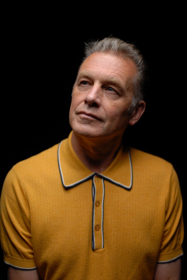Chris Packham looking upward.