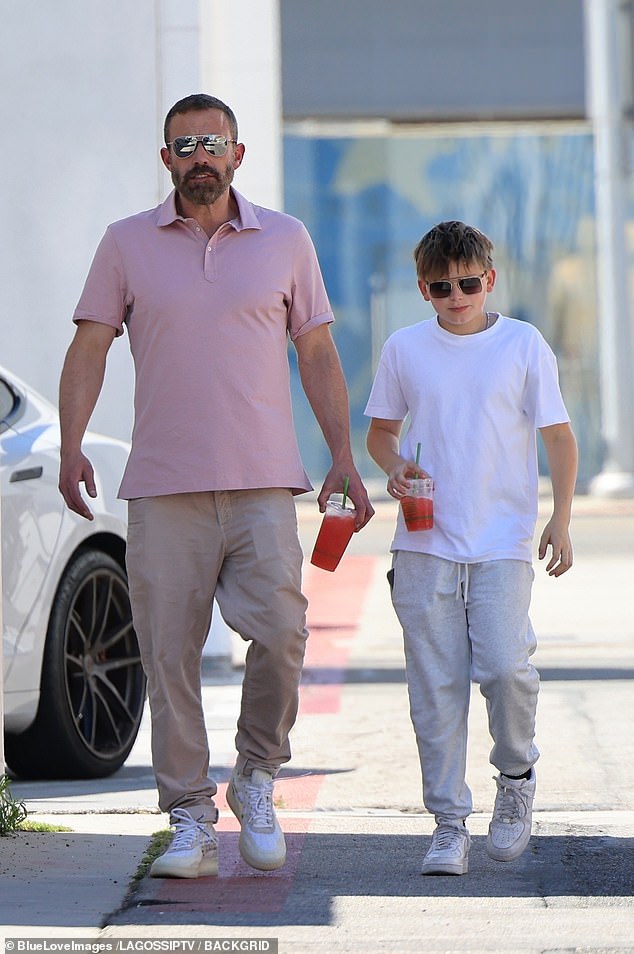 At one point, he also threw on reflective, aviator sunglasses, and his son was also spotted sporting a similar pair of shades during their outing