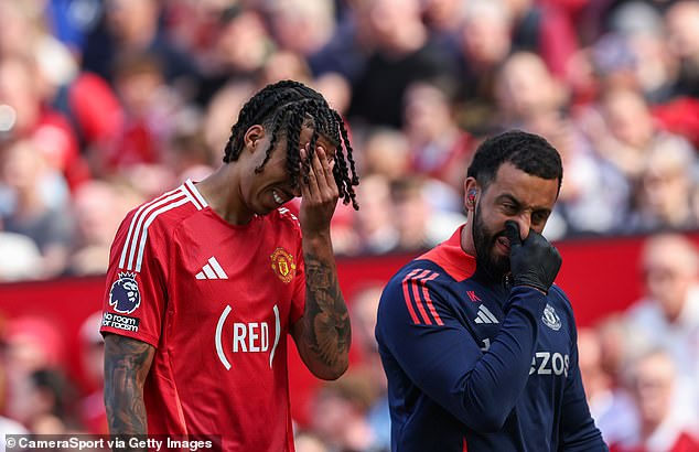 United defender Leny Yoro (left) looked dejected after picking up an injury at Old Trafford