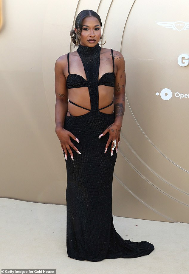 Team USA gymnast Jordan Chiles, 24, slipped into a slinky all-Black ensemble which showcased her tattoos for the event but the impact of the cut-out detailing proved to be a little lackluster