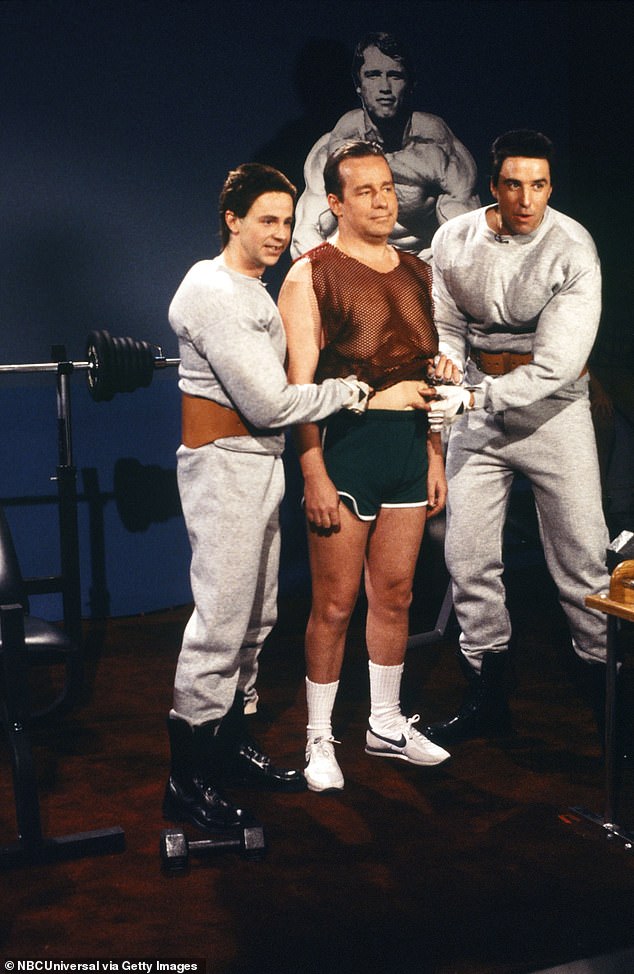 In 1986, he got his break with SNL which he joined as a writer and producer - he was nicknamed 'glue' for keeping the cast together (pictured 1987 with Dana Carvey and Kevin Nealon)