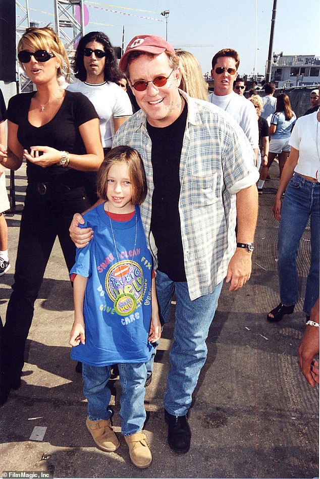 Devoted father Hartman is pictured in 1997 with his son Sean