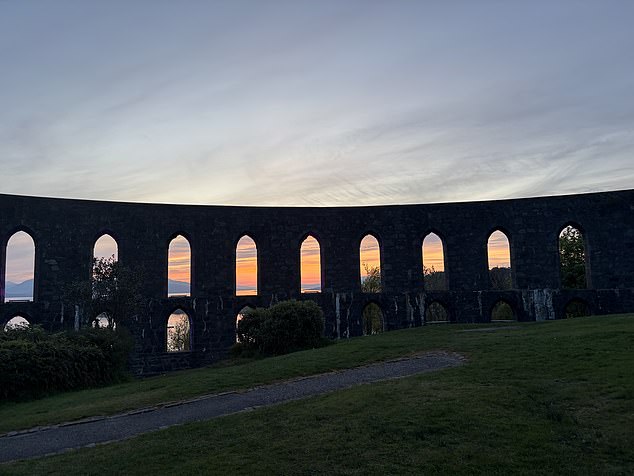 A view of Oban's sunset from inside McCaig¿s Tower which is a short uphill walk from the pier