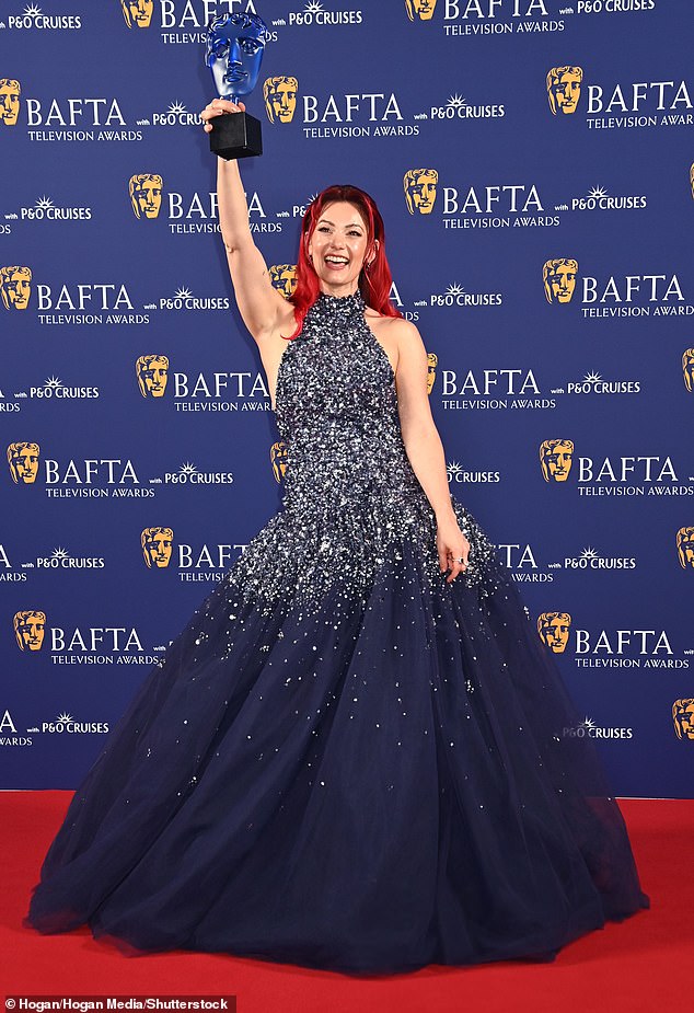 A triumphant Dianne Buswell won the Memorable Moment Award with her Strictly celebrity partner Chris McCausland for their emotional waltz