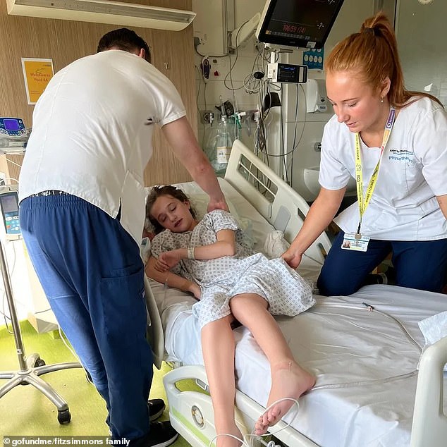 Holly had been suffering with neck pain and needed a 'highly complex and risky' eight-hour surgery to remove the 'extremely rare' tumour that could leave her paralysed