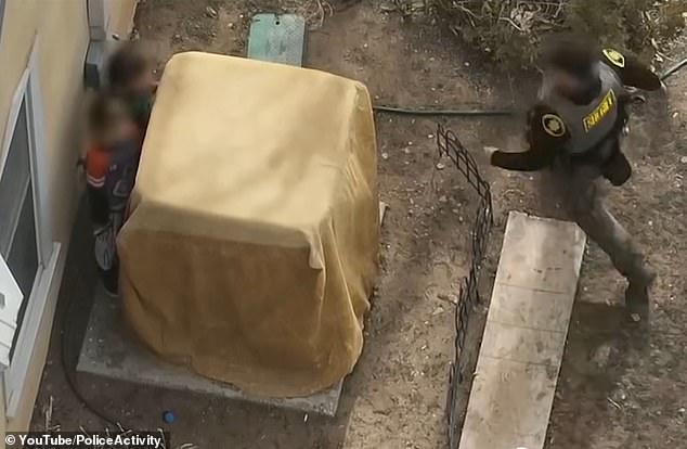 Eventually an officer rushed in and managed to snatch the weapon away from the boys