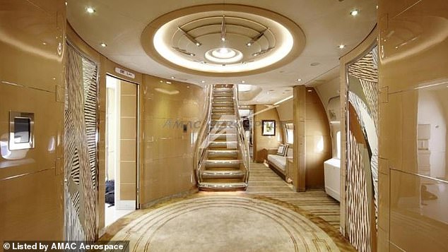 A glimmering corridor inside the plane that jives with Trump's famous love for anything and everything gold