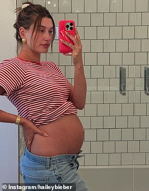 She highlighted her baby bump in several