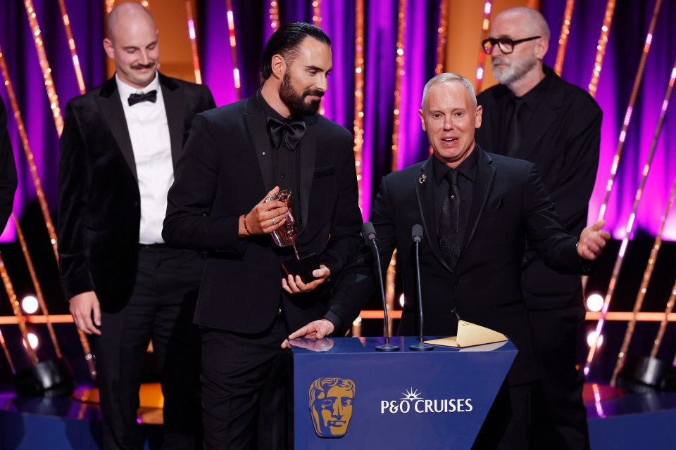 Rob Rinder and Rylan Clark accepting a BAFTA Television Award.