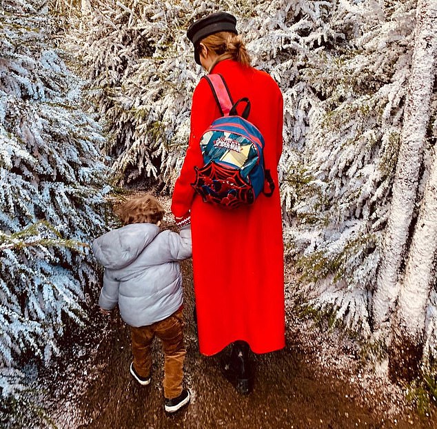 Cheryl pictured with her son Bear. Friends of the former singer say she 'will do the right thing' by their son who is set to inherit his father's entire £24million fortune