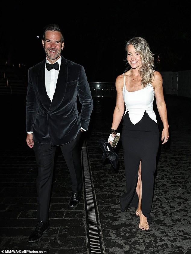 Following suit, Helen Skelton also shed her uncomfortable footwear and let her feet be free as she walked along the pavement alongside pal Gethin Jones