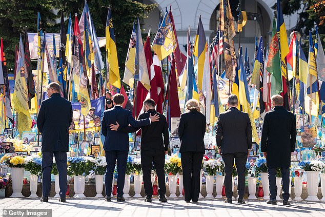 German Chancellor Friedrich Merz, French President Emmanuel Macron, Ukrainian President Volodymyr Zelensky and his wife Olena Zelenska, British Prime Minister Sir Keir Starmer and Poland's Prime Minister Donald Tusk in Maidan Square in Kyiv as European leaders meet in Ukraine for further talks on the so-called "coalition of the willing" on May 10,