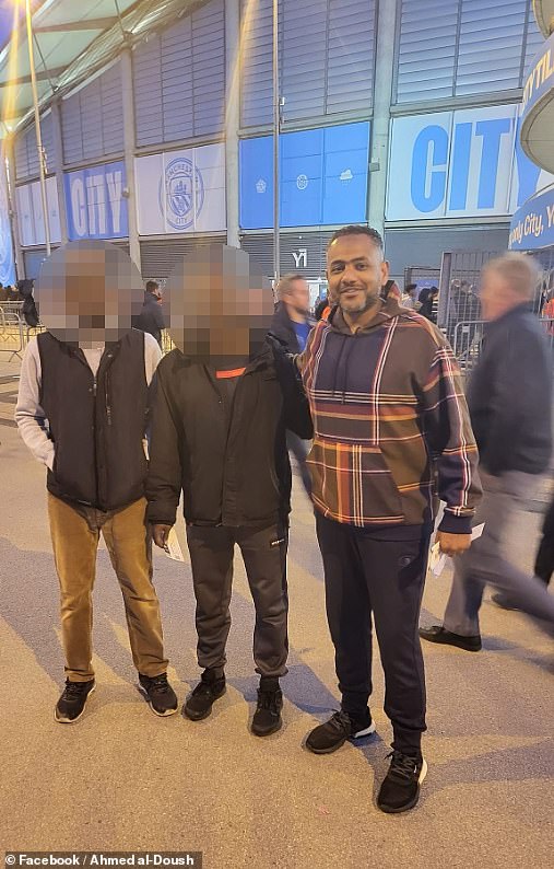 Ahmed (pictured here outside Manchester City's Etihad Stadium with two friends) has yet to meet his baby son who was born in December