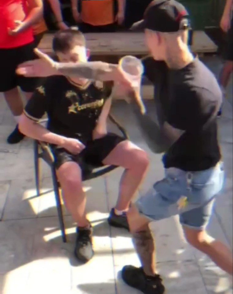 A man being slapped at the Wild Duck bar in Benidorm.