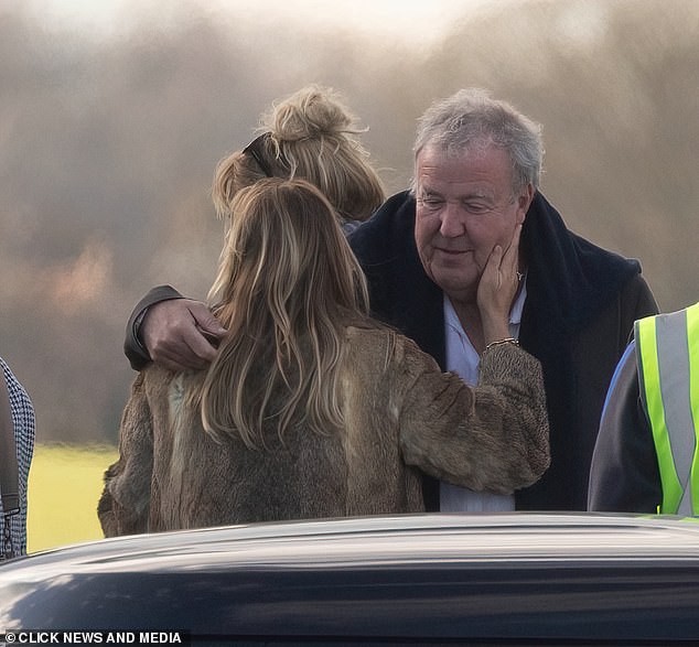 Clarkson with his partner Lisa after landing back in the UK after a weekend with the royals watching the F1