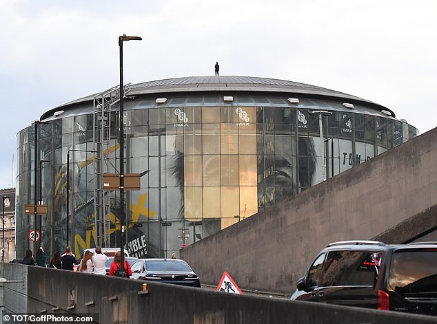 The 62-year-old daredevil was spotted Sunday in London as he filmed his latest stunt on the roof of the British Film Institute's IMAX building