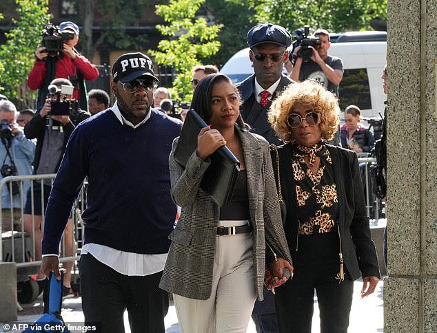 Diddy's mother Janice Combs (right) walking into the courthouse alongside fellow supporters for her son's first day on trial