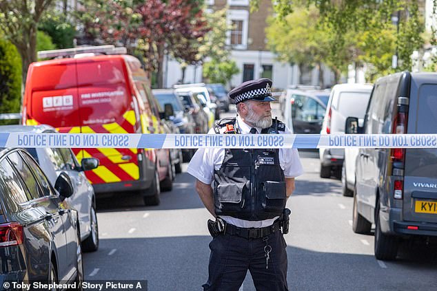 A property belonging to Keir Starmer caught on fire in the early hours of this morning. Pictured is an officer guarding the scene