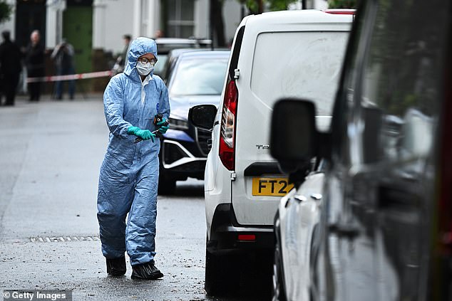 One neighbour told MailOnline how officers told him they were searching for a projectile that may have been thrown into his garden, but they did not find anything (Pictured: A forensics officer is seen near to Starmer's home)