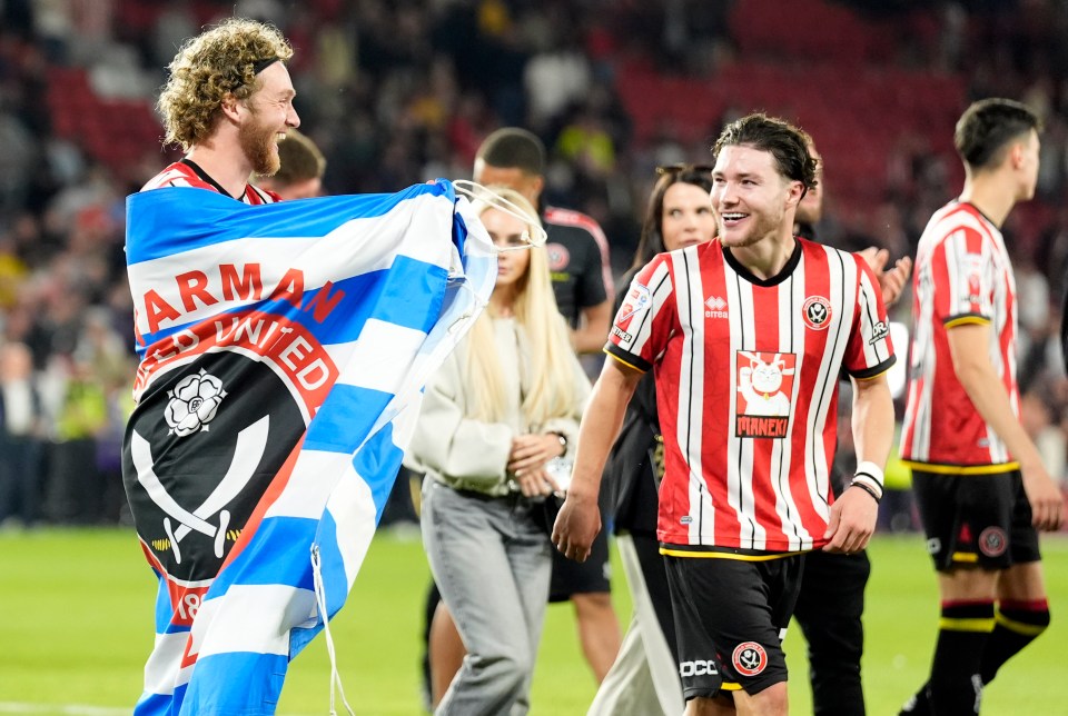 Sheffield United players Tom Davies and Callum O'Hare celebrating.